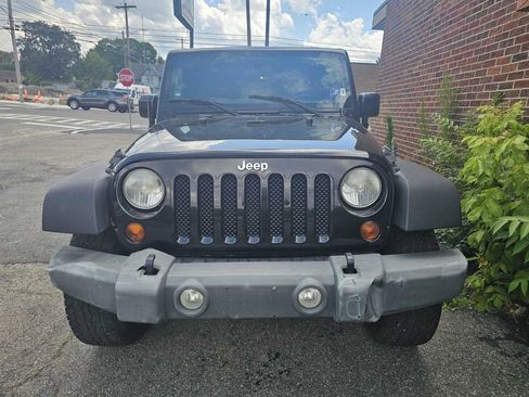 Used 2012 Jeep Wrangler Unlimited Rubicon w/ Dual Top Group image 9