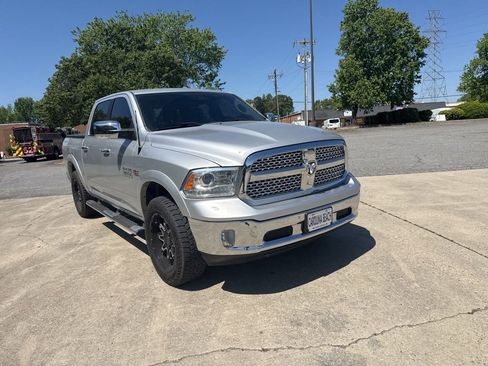 Used 2017 RAM 1500 Laramie w/ Convenience Group AWD/4WD image 1