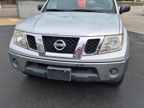 Used 2010 Nissan Frontier SE AWD/4WD image 1