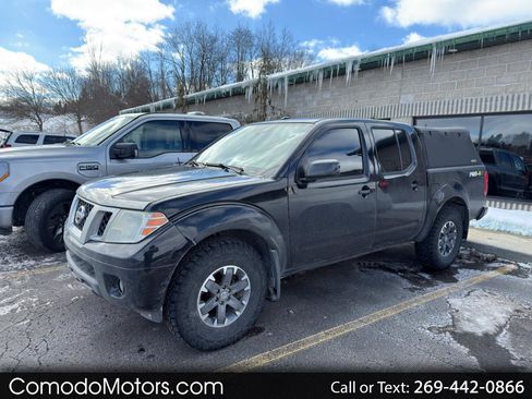 Used 2015 Nissan Frontier PRO-4X image 1