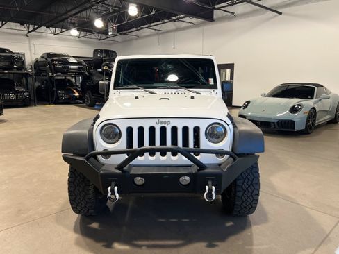 Used 2014 Jeep Wrangler Unlimited Rubicon w/ Dual Top Group AWD/4WD image 8