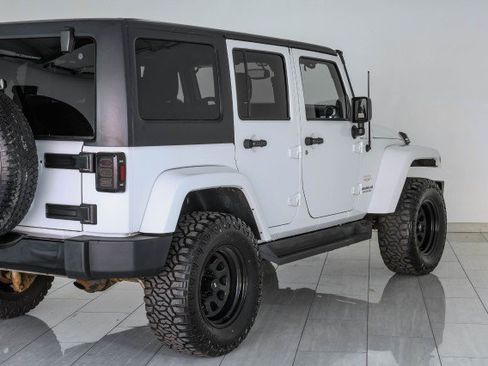 Used 2014 Jeep Wrangler Unlimited Sahara w/ Dual Top Group AWD/4WD image 49