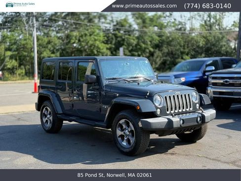 Used 2016 Jeep Wrangler Unlimited Sahara w/ Dual Top Group AWD/4WD image 1