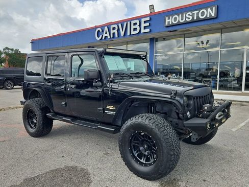 Used 2015 Jeep Wrangler Unlimited Sahara AWD/4WD image 1