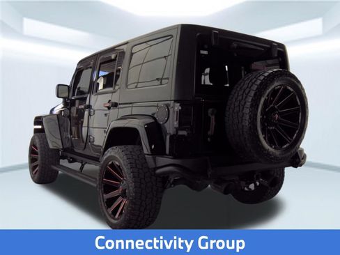 Used 2016 Jeep Wrangler Unlimited Sahara AWD/4WD image 4