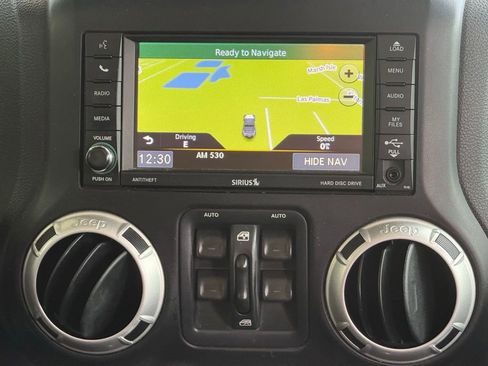 Used 2014 Jeep Wrangler Unlimited Sahara w/ Connectivity Group AWD/4WD image 12