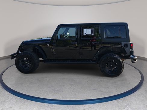 Used 2013 Jeep Wrangler Unlimited Sahara w/ Dual Top Group AWD/4WD image 8