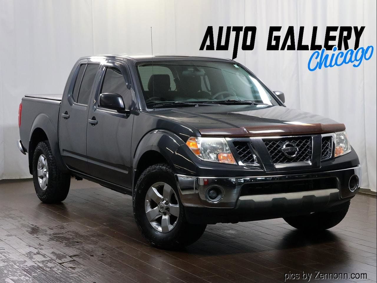 Used 2010 Nissan Frontier SE AWD/4WD image 1
