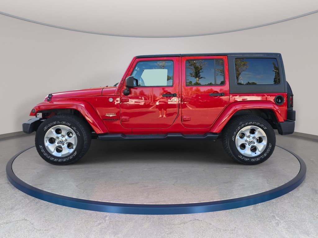 Used 2013 Jeep Wrangler Unlimited Sahara AWD/4WD image 9
