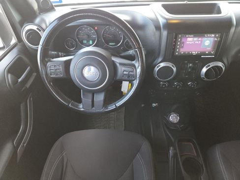 Used 2013 Jeep Wrangler Unlimited Sahara w/ Dual Top Group image 12