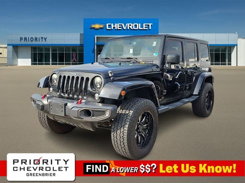 Used 2014 Jeep Wrangler Unlimited Sahara w/ Connectivity Group AWD/4WD image 1