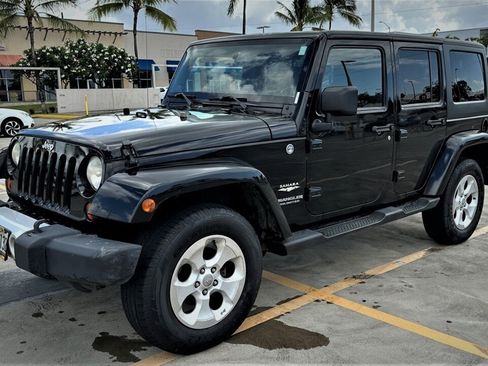 Used 2013 Jeep Wrangler Unlimited Sahara AWD/4WD image 1