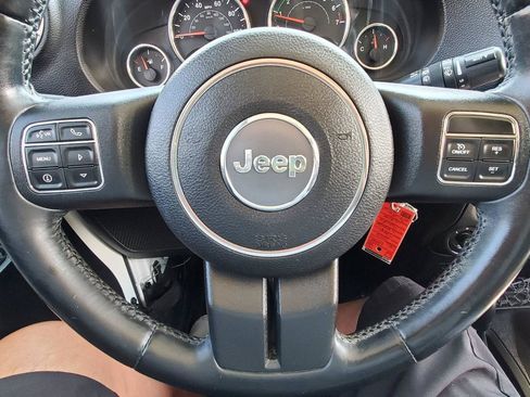 Used 2012 Jeep Wrangler Unlimited Sahara w/ Dual Top Group AWD/4WD image 11