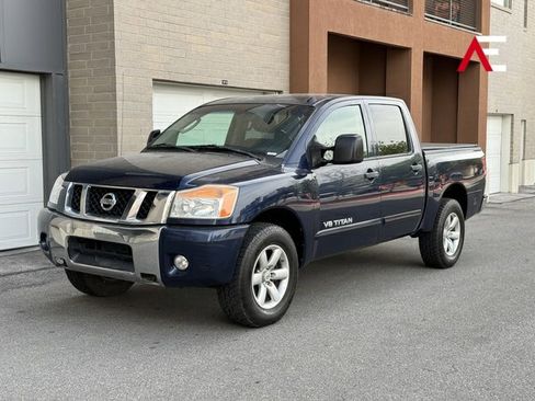 Used 2010 Nissan Titan SE w/ SE Value Truck Pkg AWD/4WD image 1