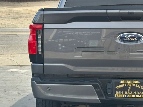 Used 2023 Ford F150 Lightning XLT w/ Equipment Group 312A High image 9