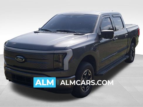 Used 2023 Ford F150 Lightning XLT AWD/4WD image 1