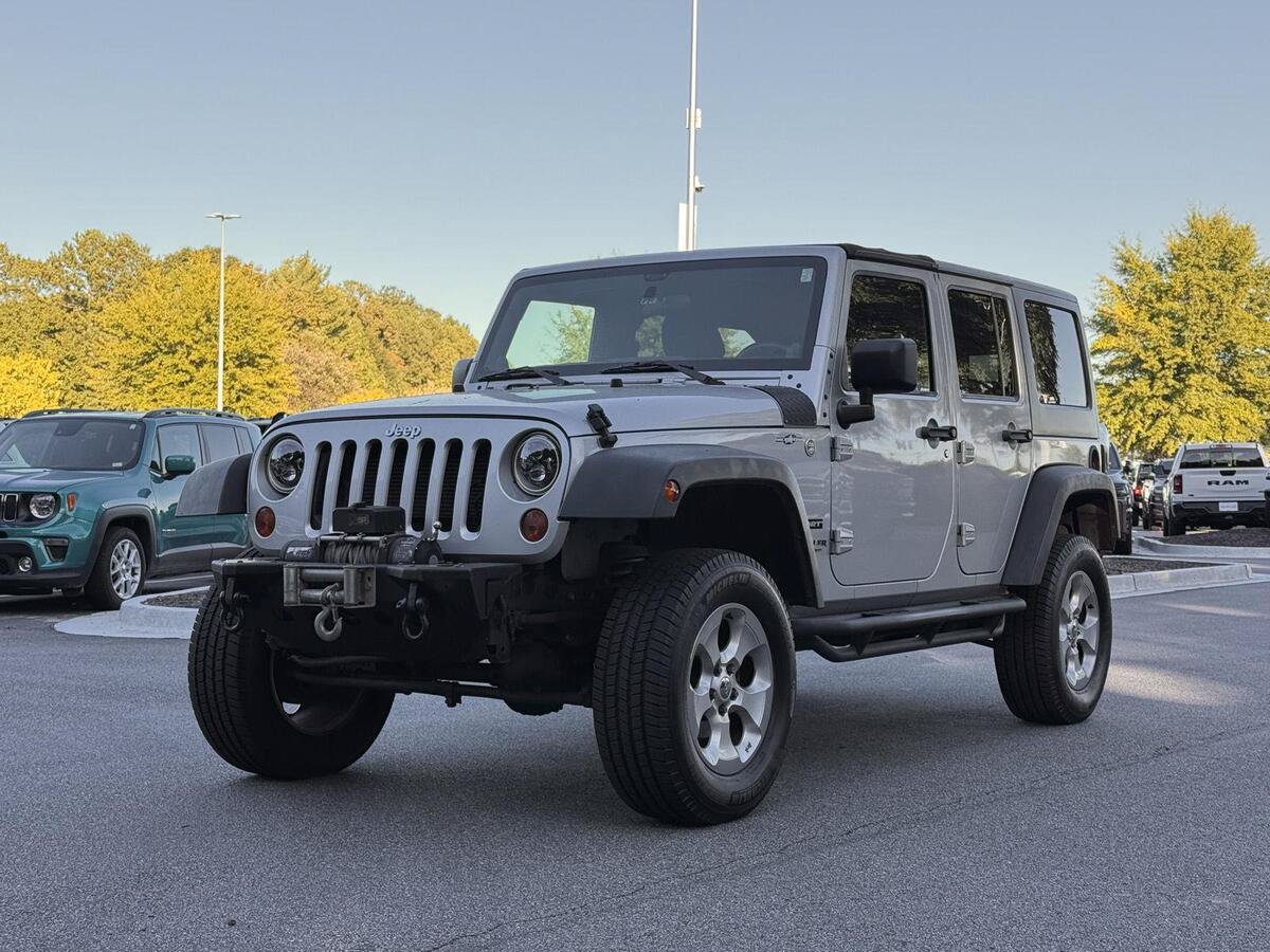 Used 2012 Jeep Wrangler Unlimited Sport AWD/4WD image 1