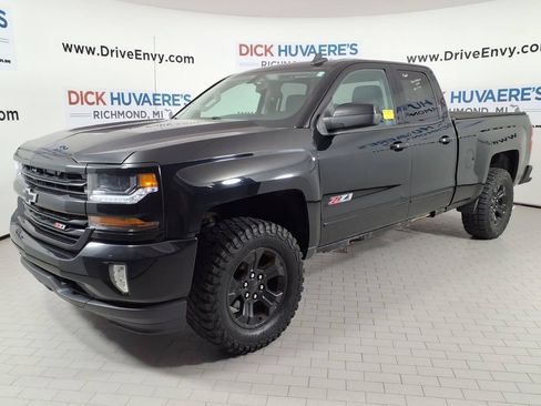 Used 2017 Chevrolet Silverado 1500 LT w/ Midnight Edition AWD/4WD image 1