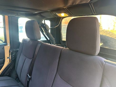 Used 2013 Jeep Wrangler Unlimited Sport w/ Mopar Black Appearance Group image 13