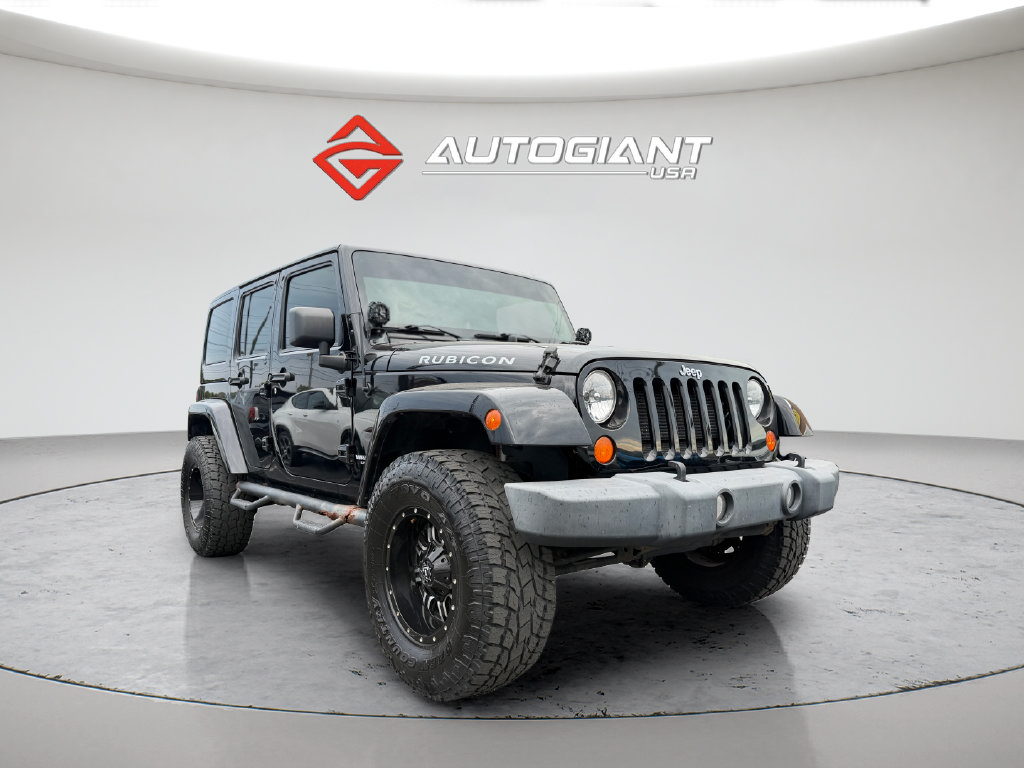 Used 2012 Jeep Wrangler Unlimited Rubicon w/ Dual Top Group AWD/4WD image 12