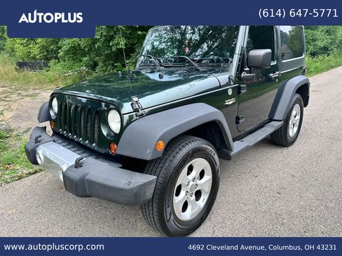 Used 2011 Jeep Wrangler Sahara w/ Dual Top Group AWD/4WD image 1