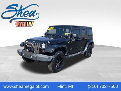 Used 2012 Jeep Wrangler Unlimited Sahara w/ Dual Top Group