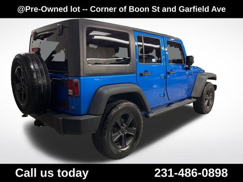 Used 2016 Jeep Wrangler Unlimited Sport w/ Mopar Black Appearance Group AWD/4WD image 10