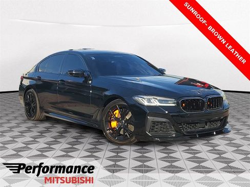 Used 2021 BMW M550i xDrive w/ Executive Package image 1