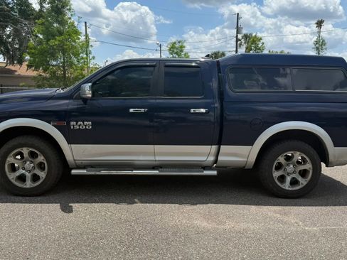 Used 2015 RAM 1500 Laramie w/ Convenience Group AWD/4WD image 1