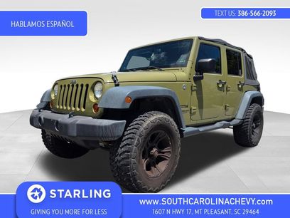 Used 2013 Jeep Wrangler Unlimited Sport