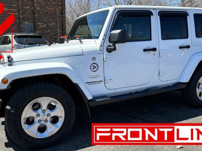 Used 2014 Jeep Wrangler Unlimited Sahara w/ Dual Top Group