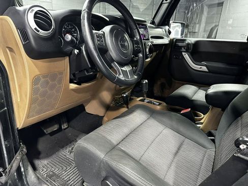 Used 2012 Jeep Wrangler Unlimited Sahara w/ Dual Top Group AWD/4WD image 21