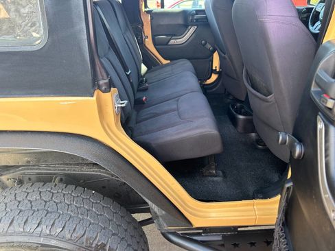 Used 2013 Jeep Wrangler Unlimited Sport w/ Mopar Black Appearance Group image 24