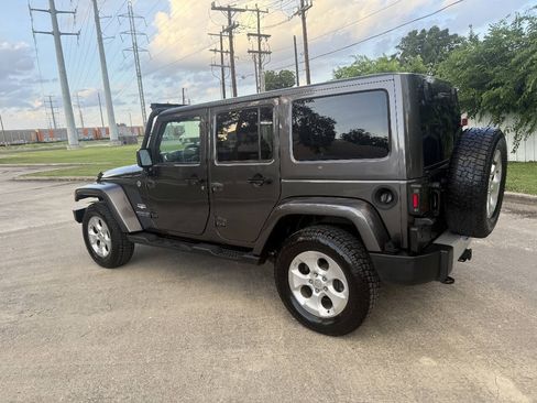 Used 2014 Jeep Wrangler Unlimited Sahara w/ Max Tow Package AWD/4WD image 6