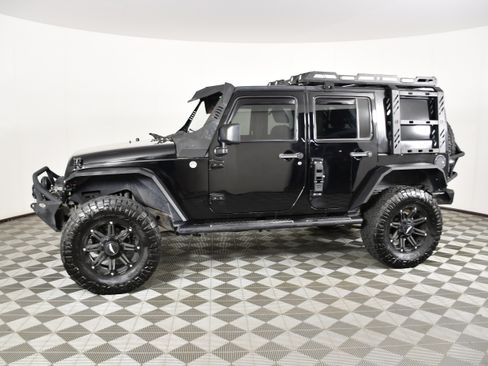 Used 2011 Jeep Wrangler Unlimited Sport AWD/4WD image 9