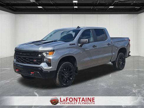 Certified 2024 Chevrolet Silverado 1500 Custom Trail Boss w/ LPO, Dark Essentials Package AWD/4WD image 1