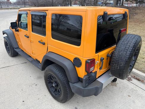 Used 2012 Jeep Wrangler Unlimited Sahara w/ Dual Top Group image 4