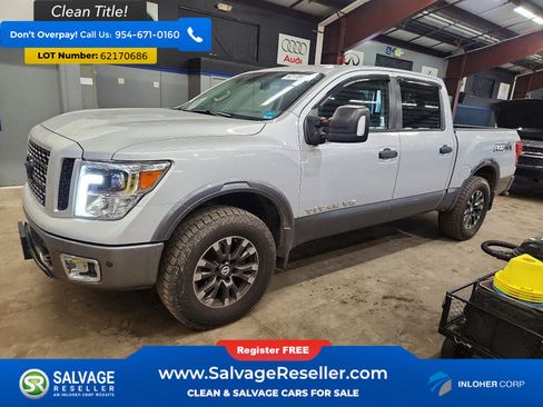 Used 2018 Nissan Titan PRO-4X w/ Pro-4x Utility Package AWD/4WD image 1