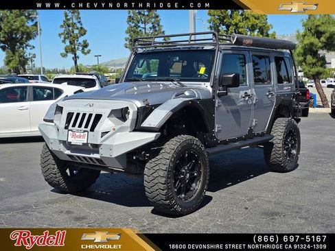 Used 2016 Jeep Wrangler Unlimited Sahara w/ Connectivity Group image 1