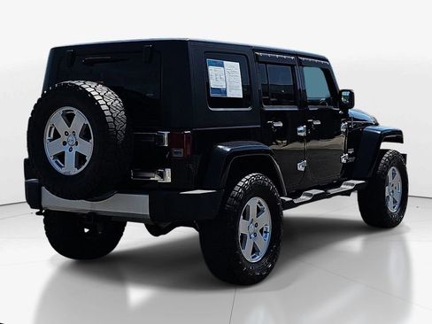 Used 2010 Jeep Wrangler Unlimited Sahara w/ Dual Top Group AWD/4WD image 6