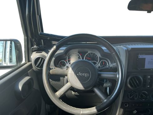 Used 2010 Jeep Wrangler Unlimited Rubicon w/ Dual Top Group image 11