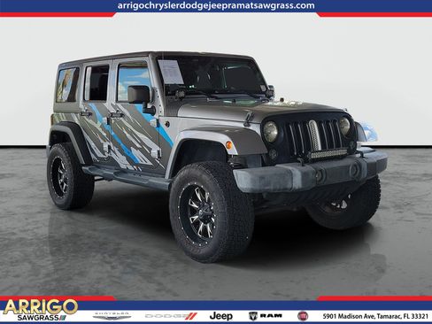 Used 2014 Jeep Wrangler Unlimited Sahara w/ Dual Top Group AWD/4WD image 1