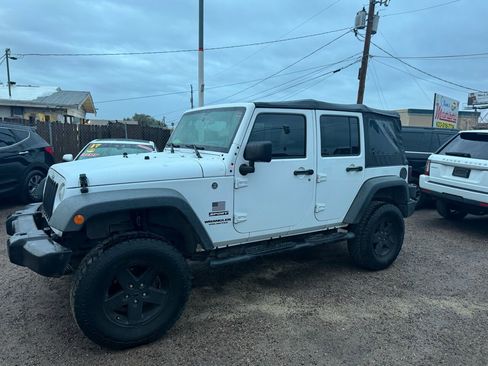 Used 2017 Jeep Wrangler Unlimited Sport image 1