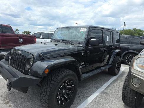 Used 2014 Jeep Wrangler Unlimited Sahara w/ Connectivity Group AWD/4WD image 1