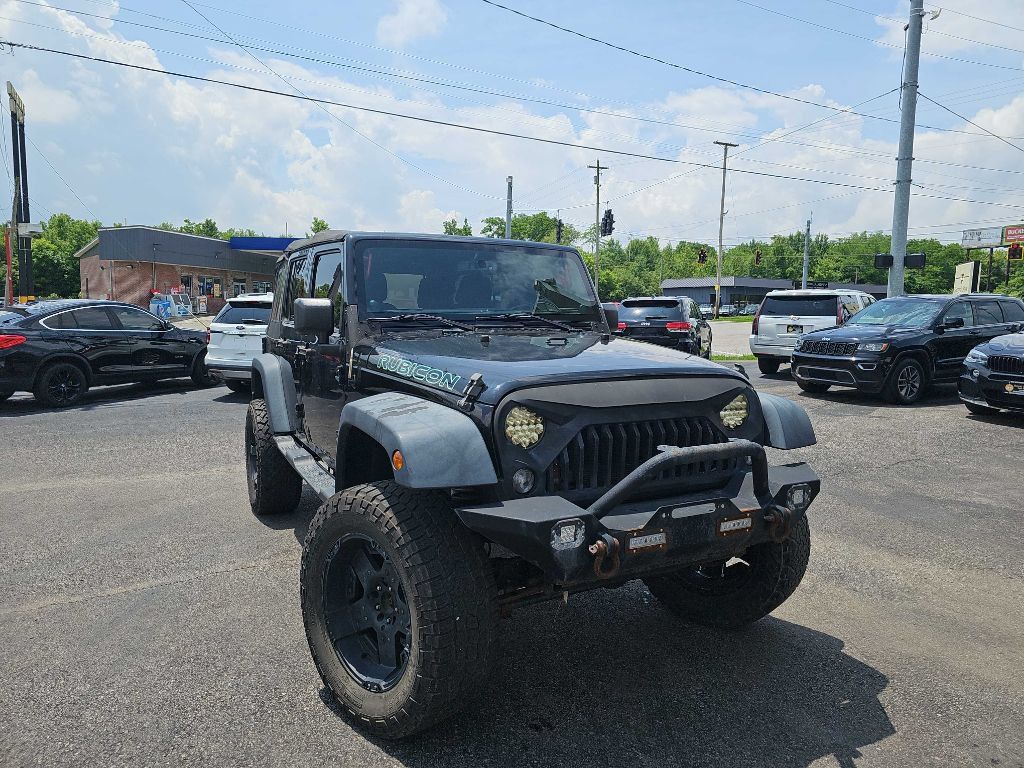 Used 2014 Jeep Wrangler Unlimited Rubicon w/ Connectivity Group AWD/4WD image 2