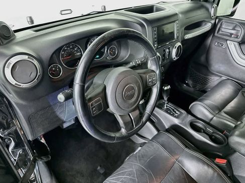 Used 2012 Jeep Wrangler Unlimited Sahara w/ Trailer Tow Group AWD/4WD image 2