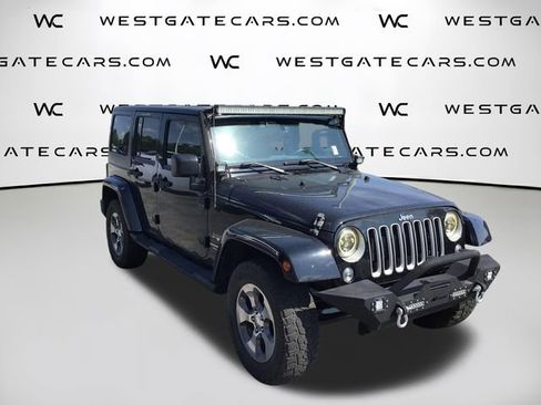 Used 2016 Jeep Wrangler Unlimited Sahara AWD/4WD image 1