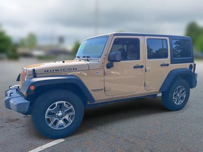 Used 2014 Jeep Wrangler Unlimited Rubicon w/ Dual Top Group