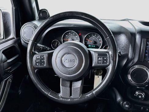 Used 2012 Jeep Wrangler Unlimited Sport w/ Connectivity Group AWD/4WD image 17