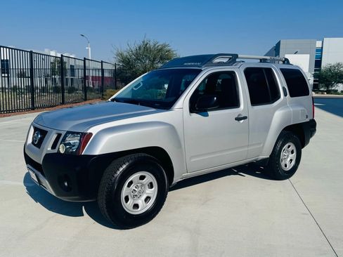 Used 2013 Nissan Xterra X image 1
